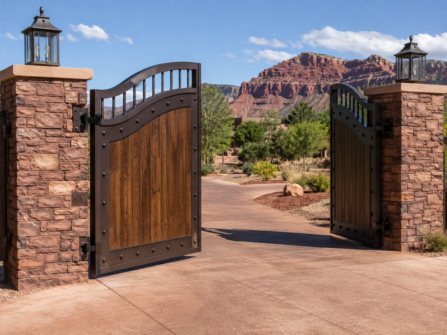 Custom ornamental iron gate installation in Southern Utah — decorative driveway entry gate
